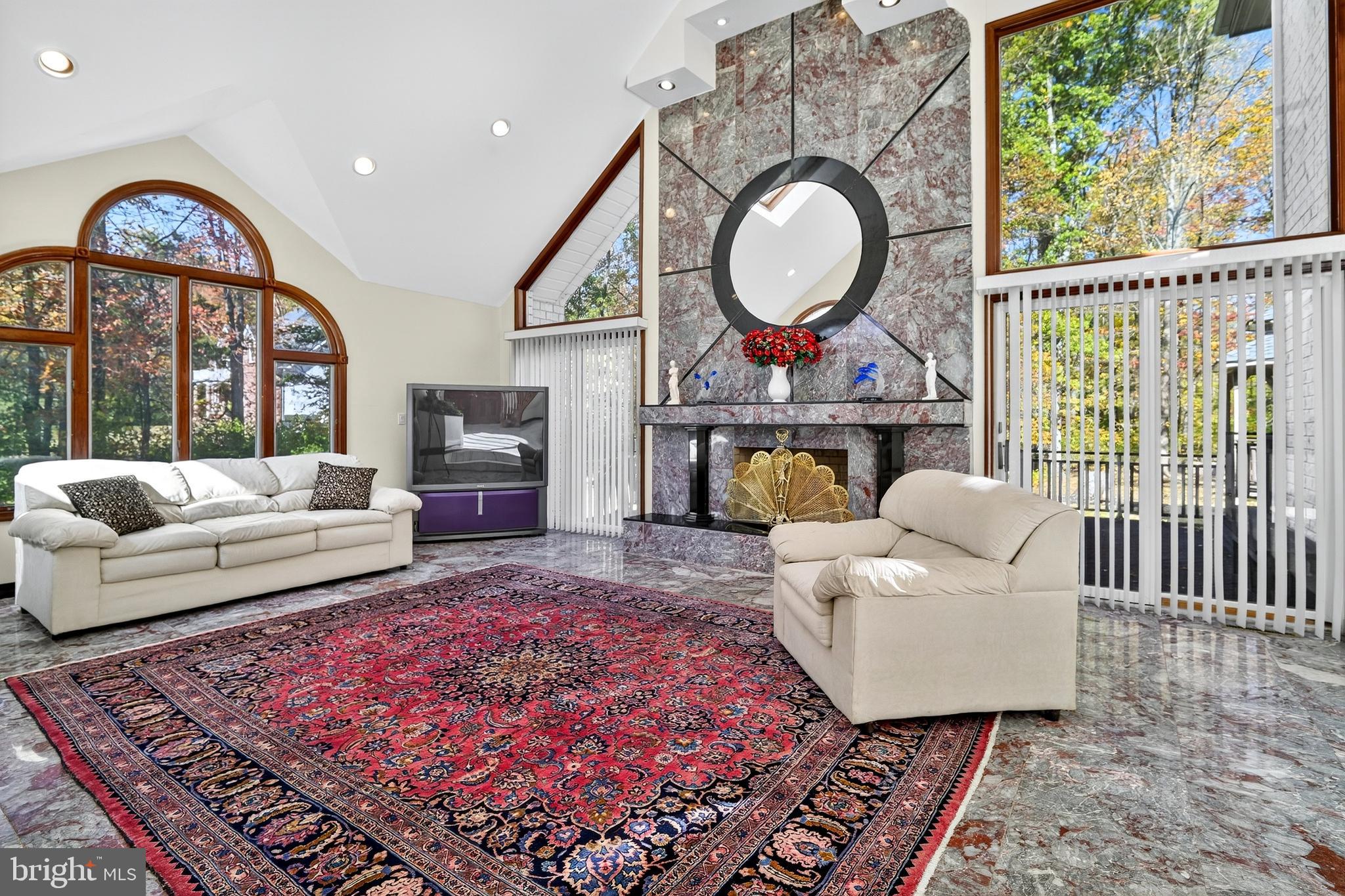 16 Benedek Road Princeton, NJ 08540 - Photo 10 of 60 a living room with furniture a rug and a large window