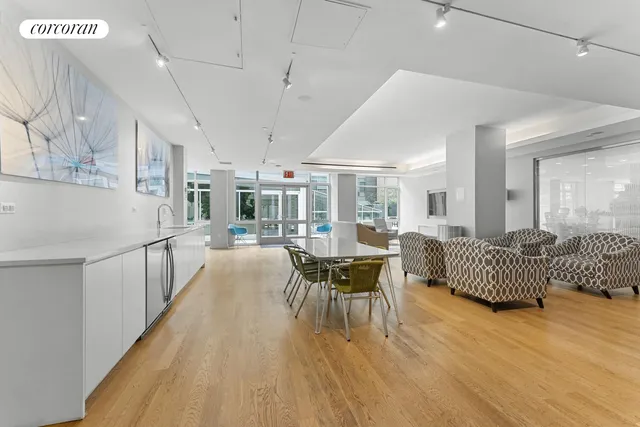a view of a hallway with washer and dryer