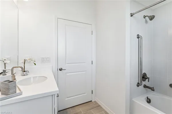 a bathroom with a sink and a tub
