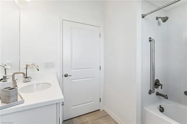 a bathroom with a sink and a tub