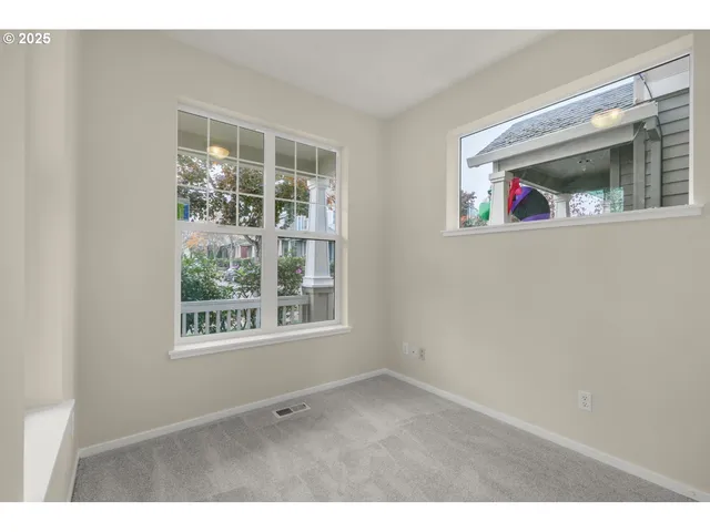 a view of an empty room with window