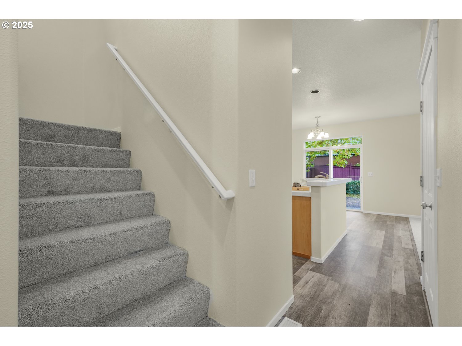 20591 Southwest Ravenswood Street Beaverton, OR 97078 - Photo 17 of 31 a view of entryway and hall with wooden floor