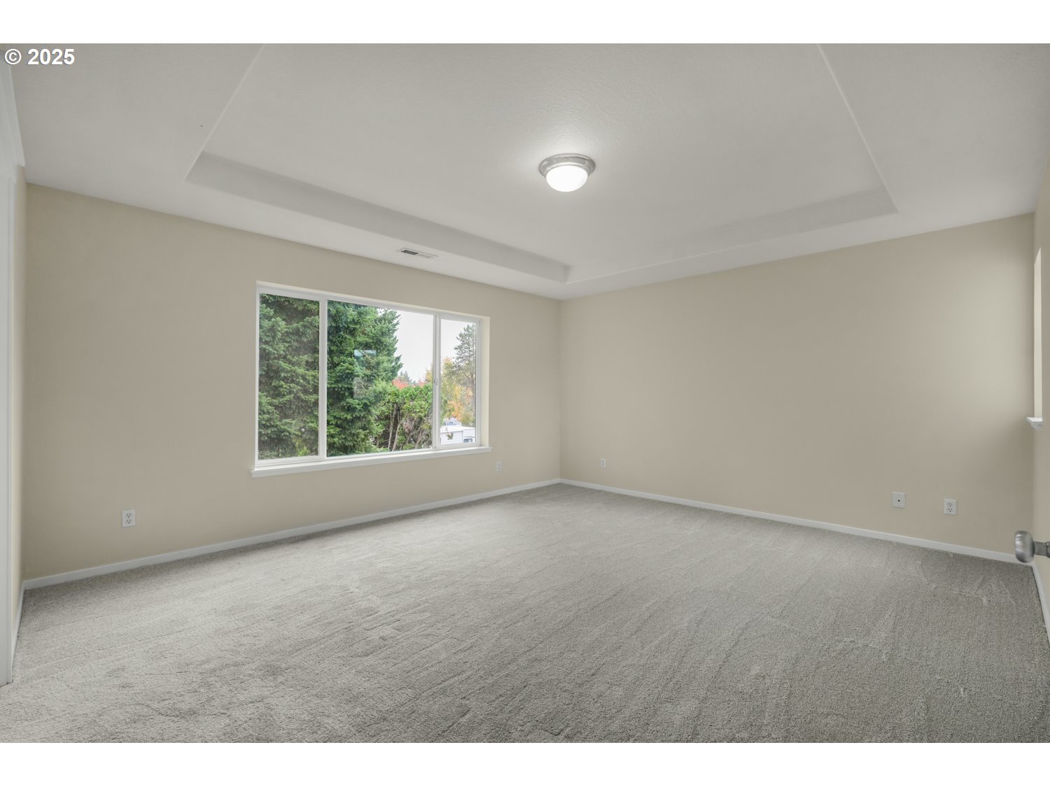 20591 Southwest Ravenswood Street Beaverton, OR 97078 - Photo 19 of 31 a view of an empty room with a window