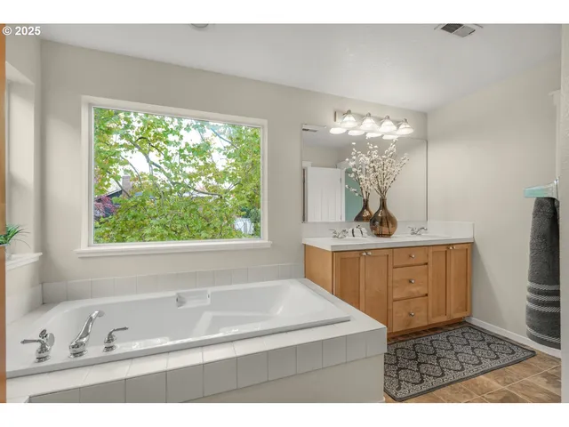 a bathroom with a bathtub sink and toilet