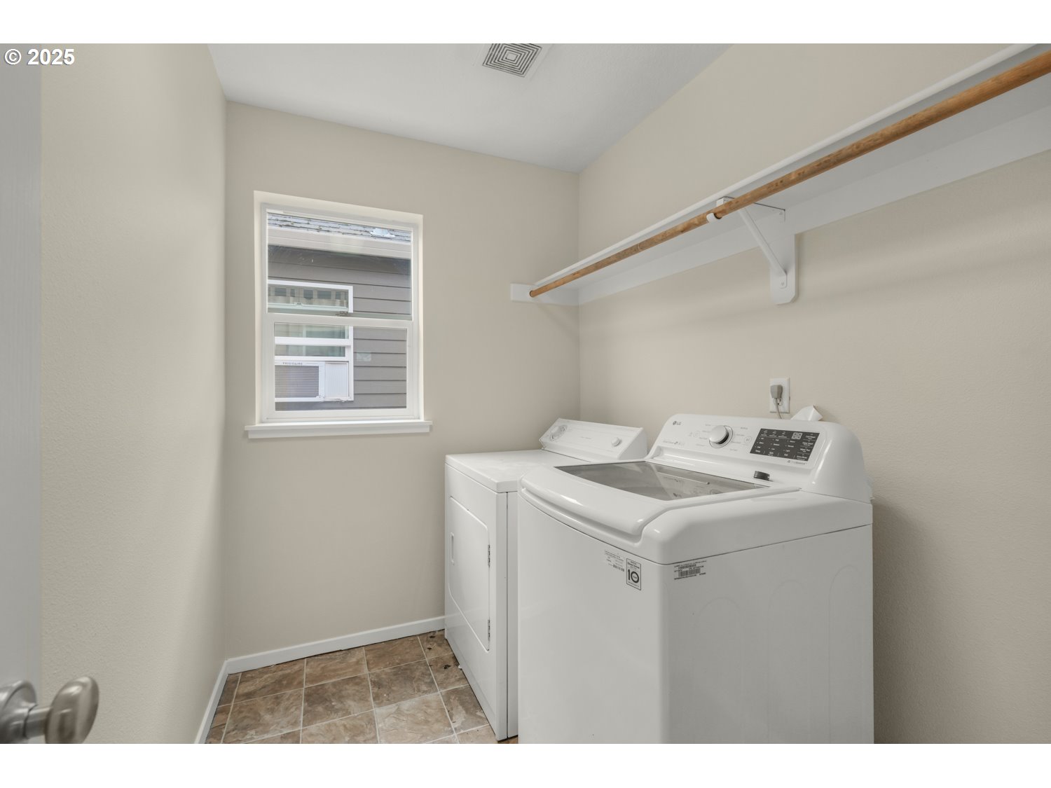 20591 Southwest Ravenswood Street Beaverton, OR 97078 - Photo 27 of 31 a utility room with dryer and washer