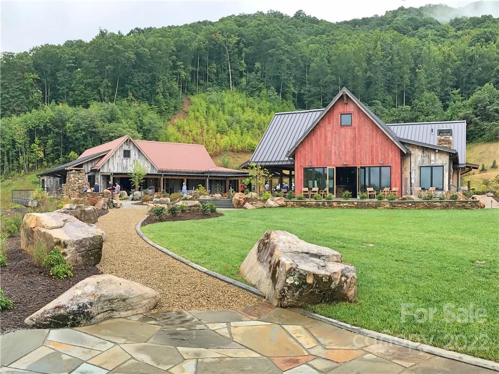 262 Tote Road, Unit 262 Sylva, NC 28779 - Photo 5 of 18 a front view of a house with garden