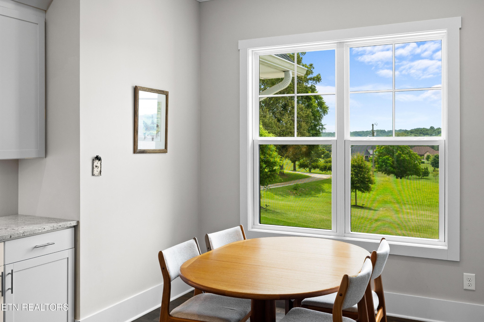 7791 Morganton Road Greenback, TN 37742 - Photo 25 of 53 a view of a dining room with furniture window and outside view