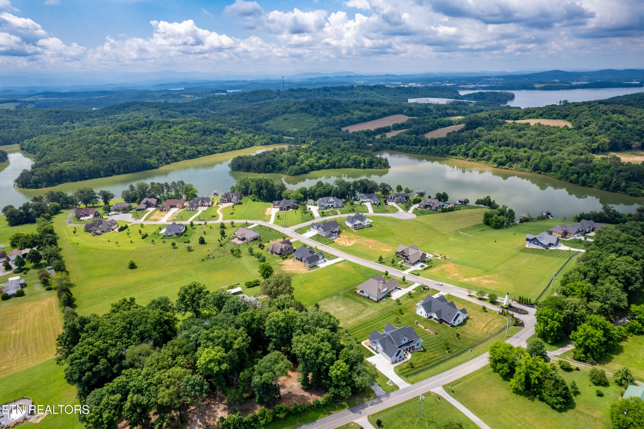 7791 Morganton Road Greenback, TN 37742 - Photo 47 of 53 a view of a lake with houses