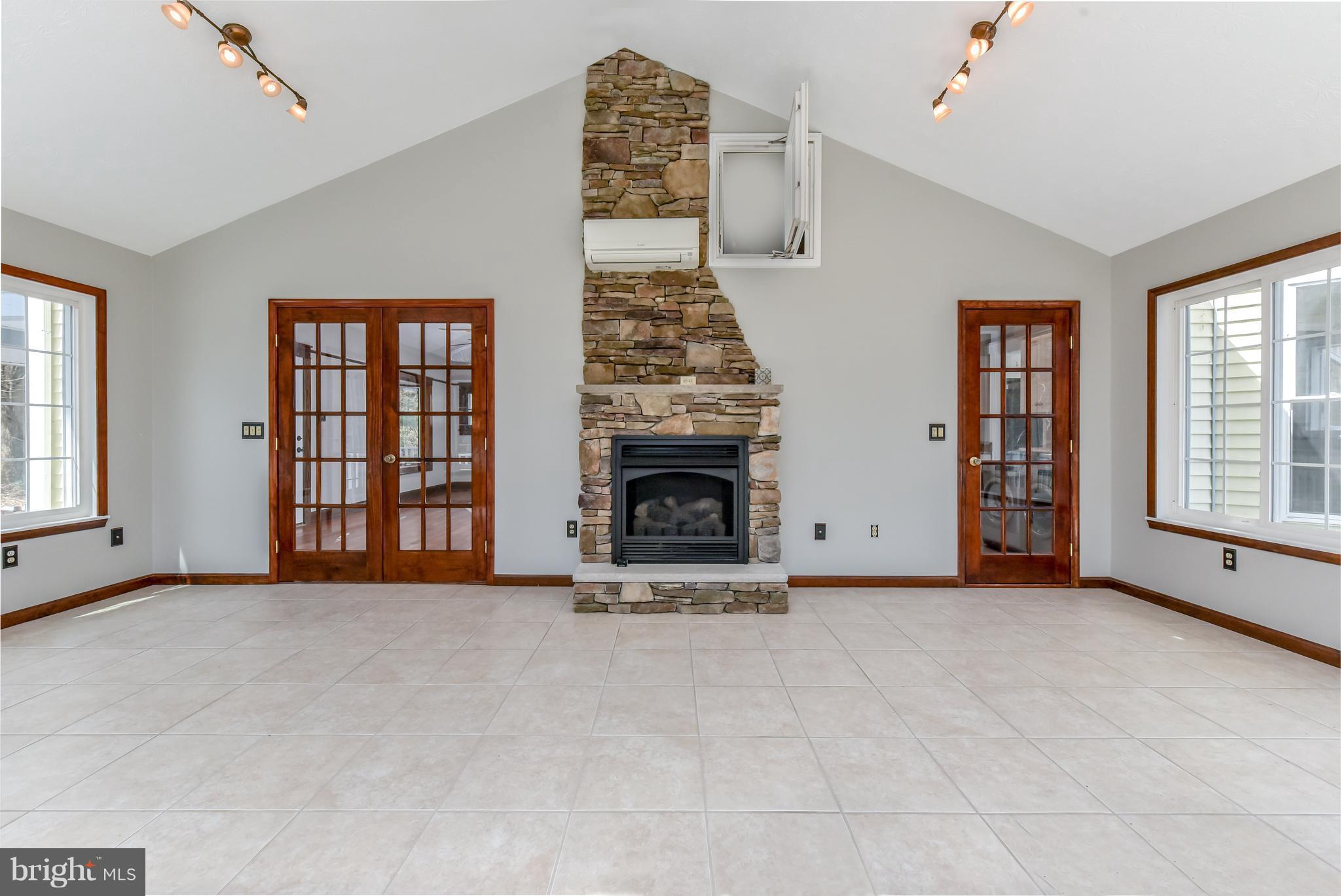 64 Rowlandsville Road Conowingo, MD 21918 - Photo 7 of 30 STONE PROPANE BURNING FIREPLACE