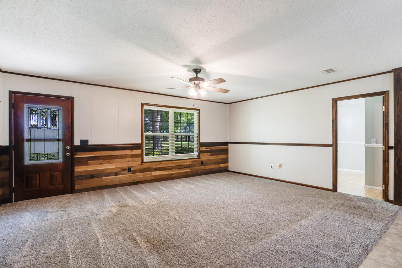 1318 John Riley Barnhill Road Baker, FL 32531 - Photo 17 of 40 a view of an empty room with a window