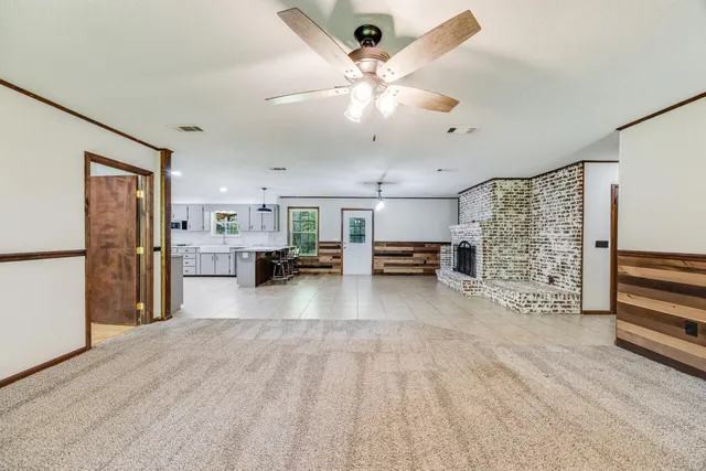 a view of fireplace and front door