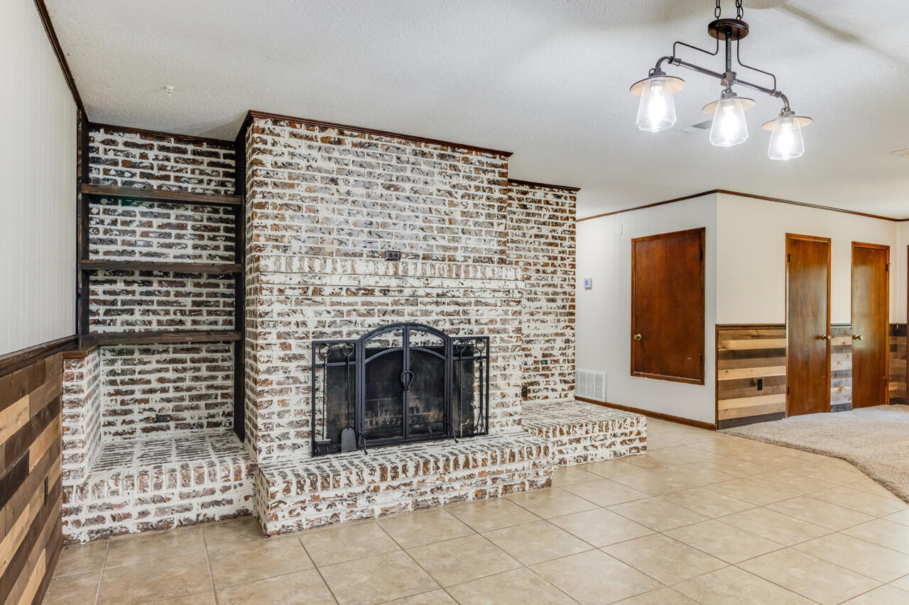 1318 John Riley Barnhill Road Baker, FL 32531 - Photo 21 of 40 a view of fireplace and front door