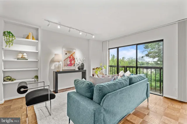 a view of a room that has a large window