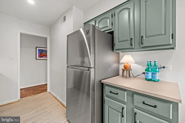 a kitchen with a stove and a microwave