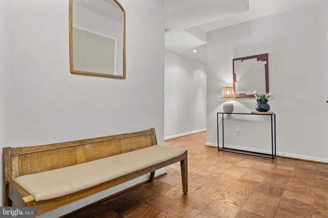 a view of a storage & utility room with two washing machine