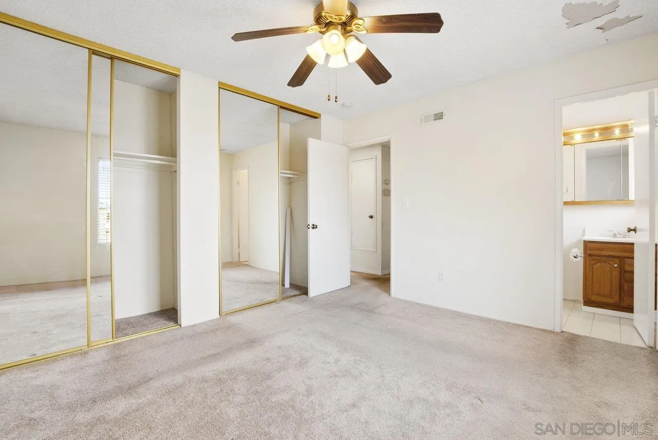 8715 Vista Del Verde El Cajon, CA 92021 - Photo 17 of 30 a view of a room with a ceiling fan and bathroom