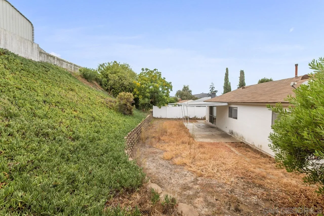 8715 Vista Del Verde El Cajon, CA 92021 - Photo 26 of 30 a view of a house with a yard