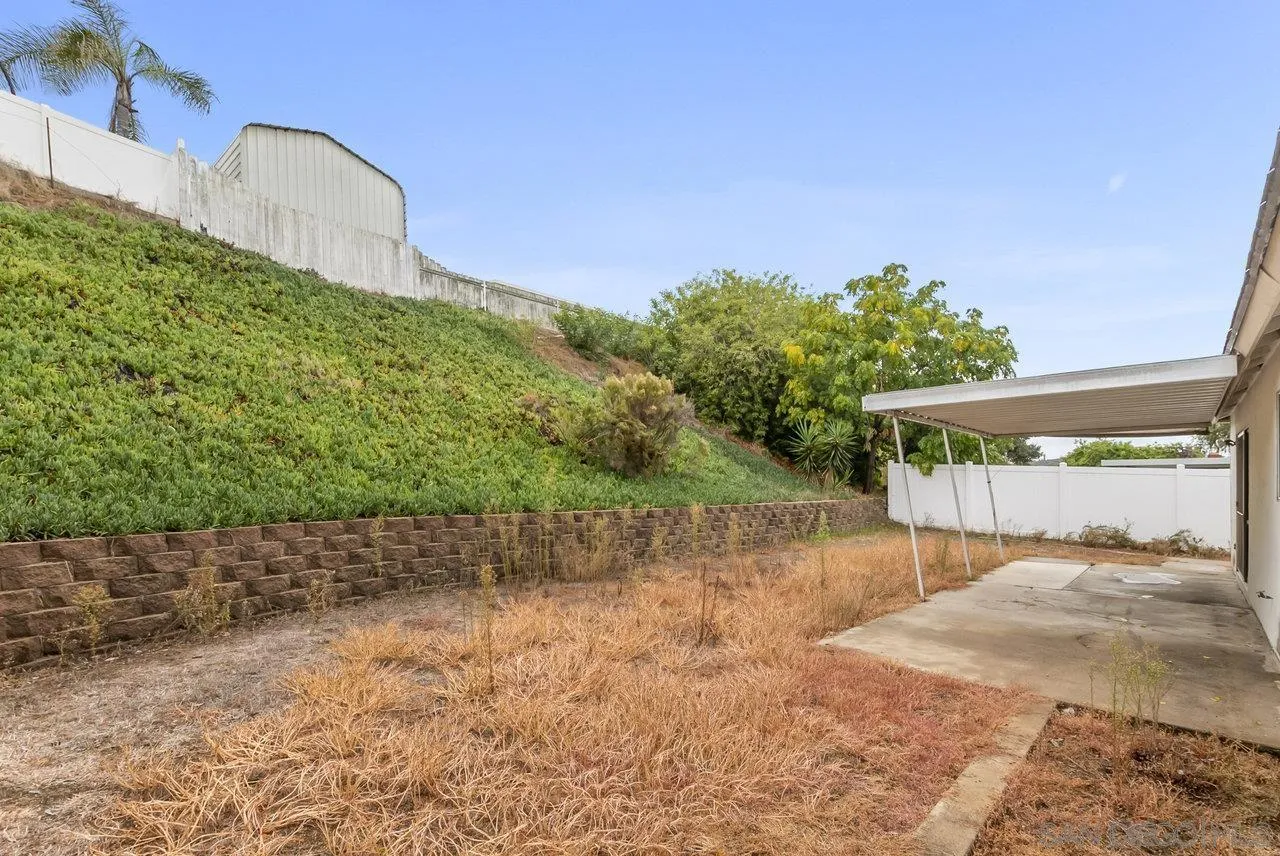 8715 Vista Del Verde El Cajon, CA 92021 - Photo 27 of 30 a backyard of a house with lots of green space