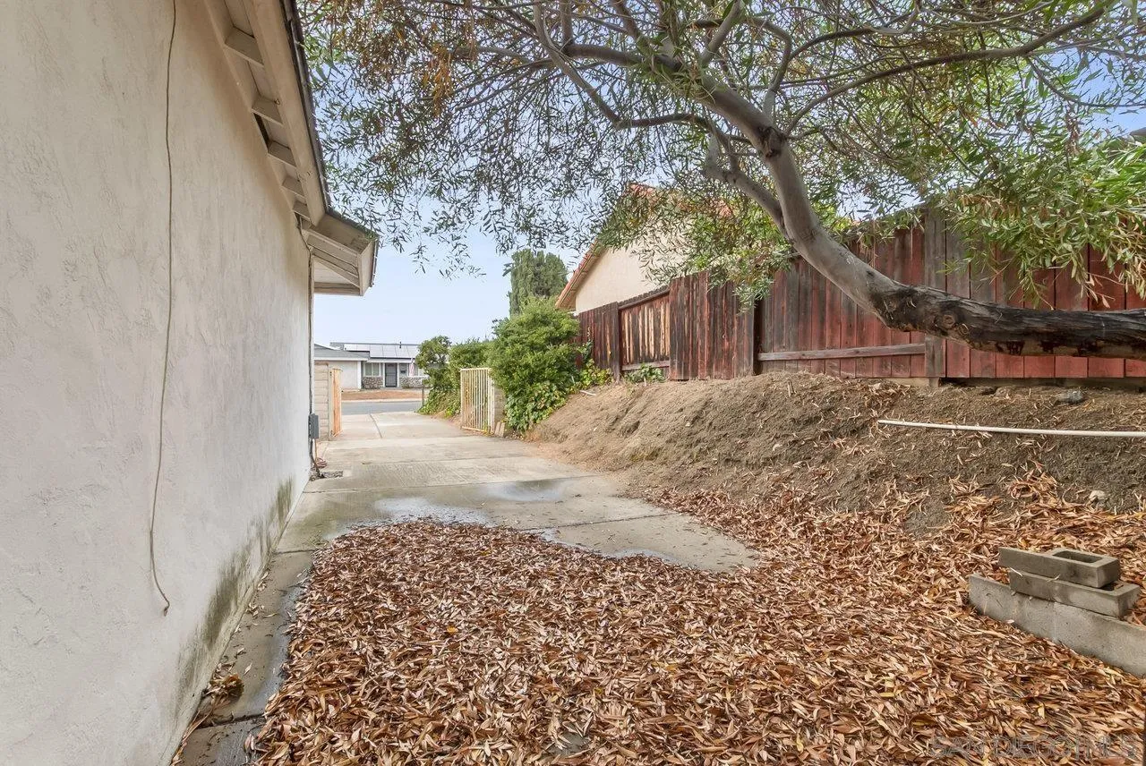 8715 Vista Del Verde El Cajon, CA 92021 - Photo 28 of 30 a view of a yard with a large tree
