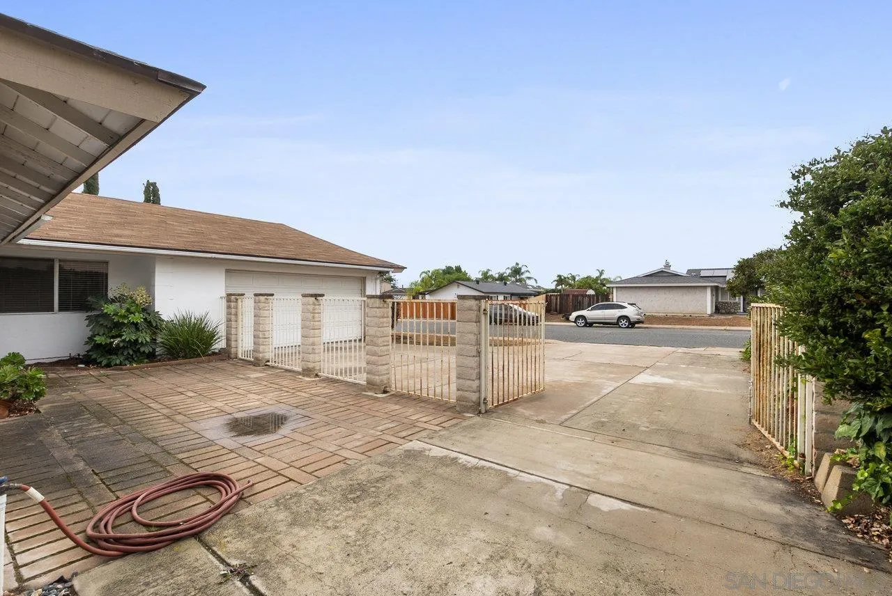 8715 Vista Del Verde El Cajon, CA 92021 - Photo 29 of 30 a view of a house with backyard and sitting area
