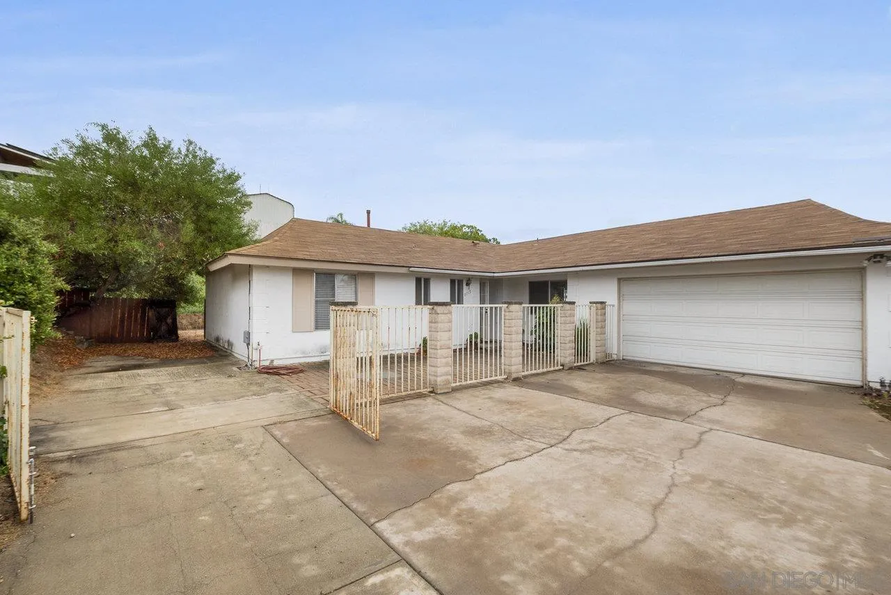 8715 Vista Del Verde El Cajon, CA 92021 - Photo 30 of 30 a view of a house with a patio and a yard