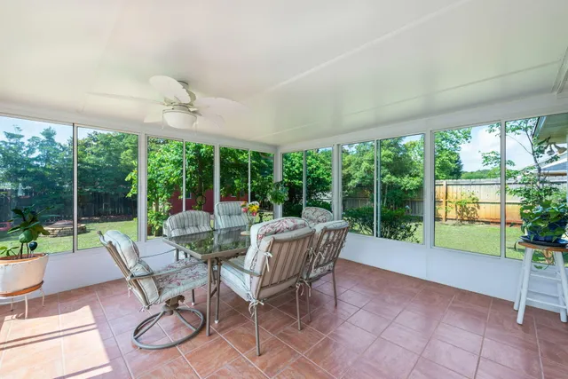 a bathroom with a tub sink and shower