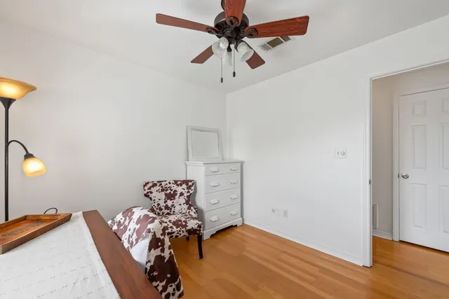 a bathroom with a sink toilet a mirror and shower