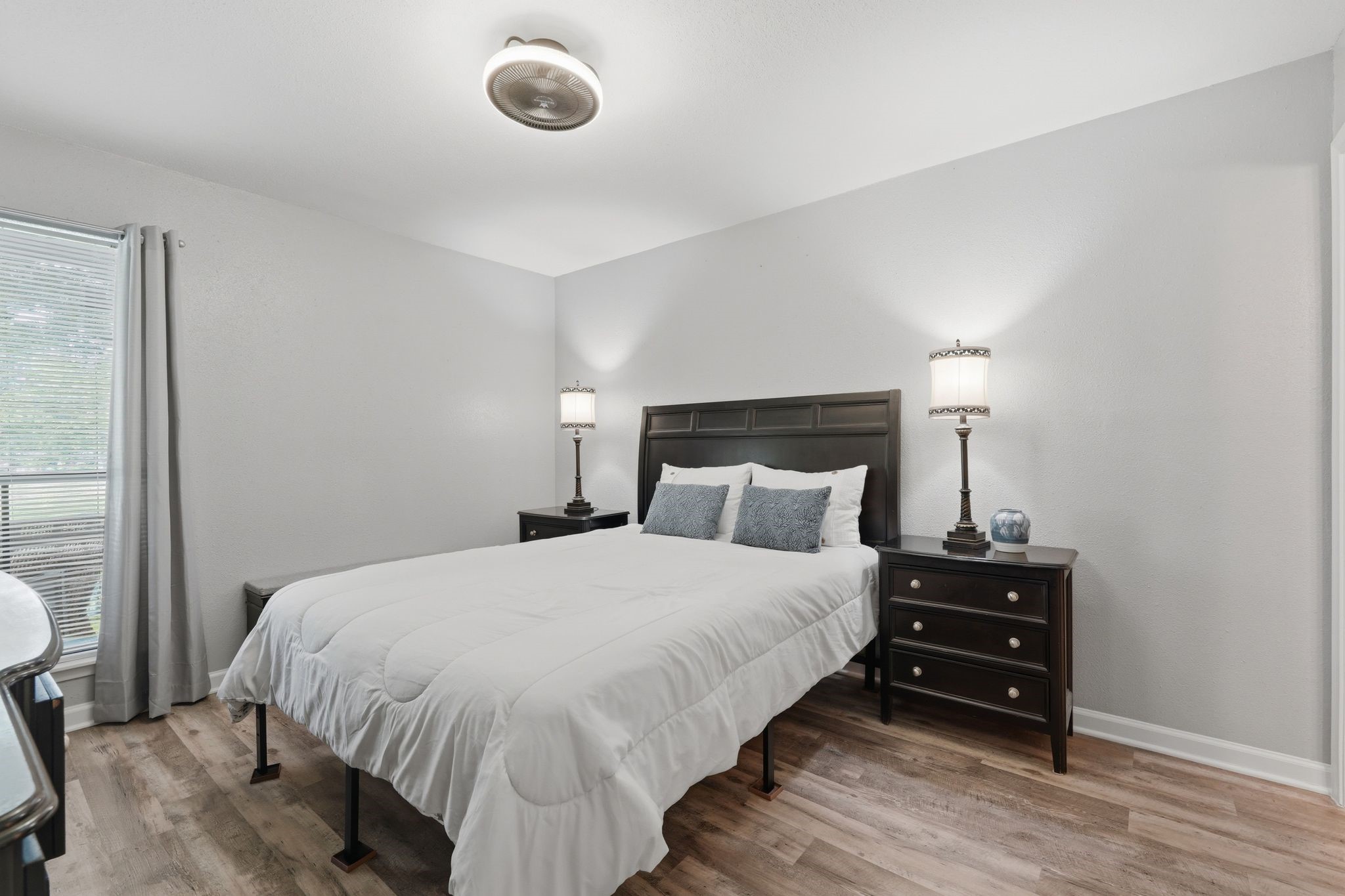 13151 Walden Road, Unit 131 Montgomery, TX 77356 - Photo 10 of 35 Peaceful primary bedroom filled with natural light and relaxing views.