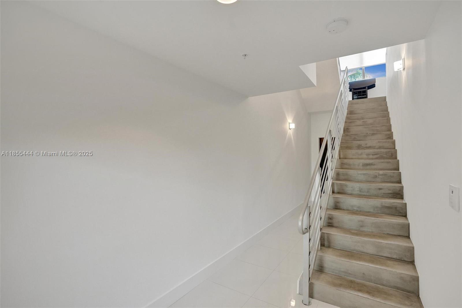516 Southeast 1st Circle Pompano Beach, FL 33060 - Photo 11 of 81 a view of a hallway with staircase