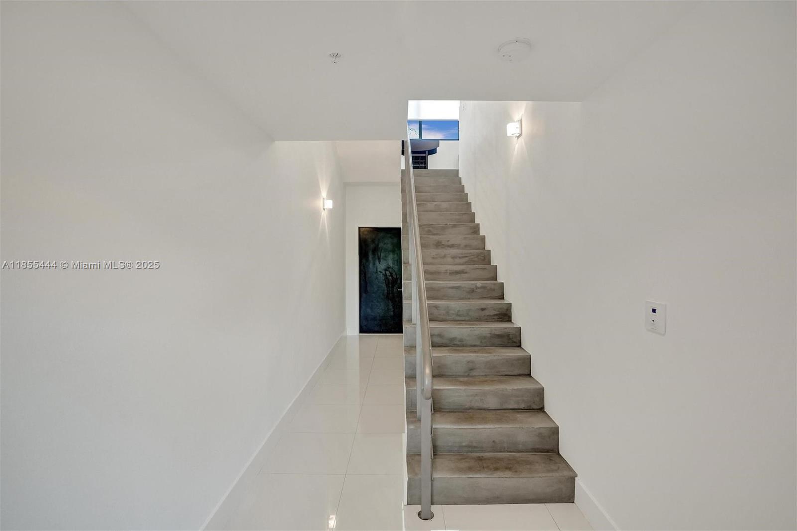 516 Southeast 1st Circle Pompano Beach, FL 33060 - Photo 12 of 81 a view of a hallway with stairs