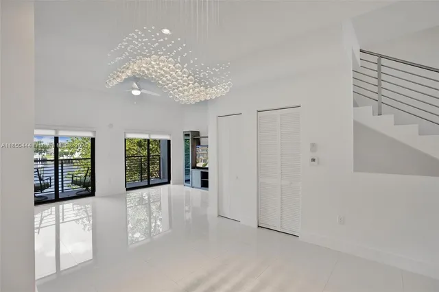 a view of balcony with wooden floor
