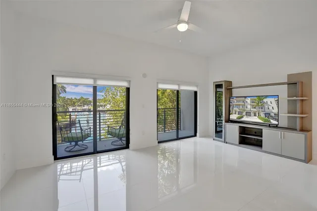 a view of a livingroom and a bathroom