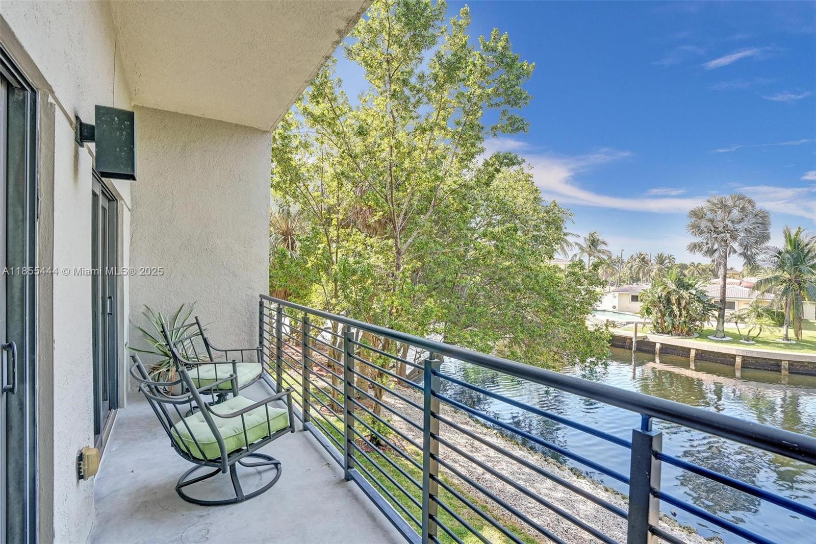 516 Southeast 1st Circle Pompano Beach, FL 33060 - Photo 28 of 81 a view of a balcony with chairs