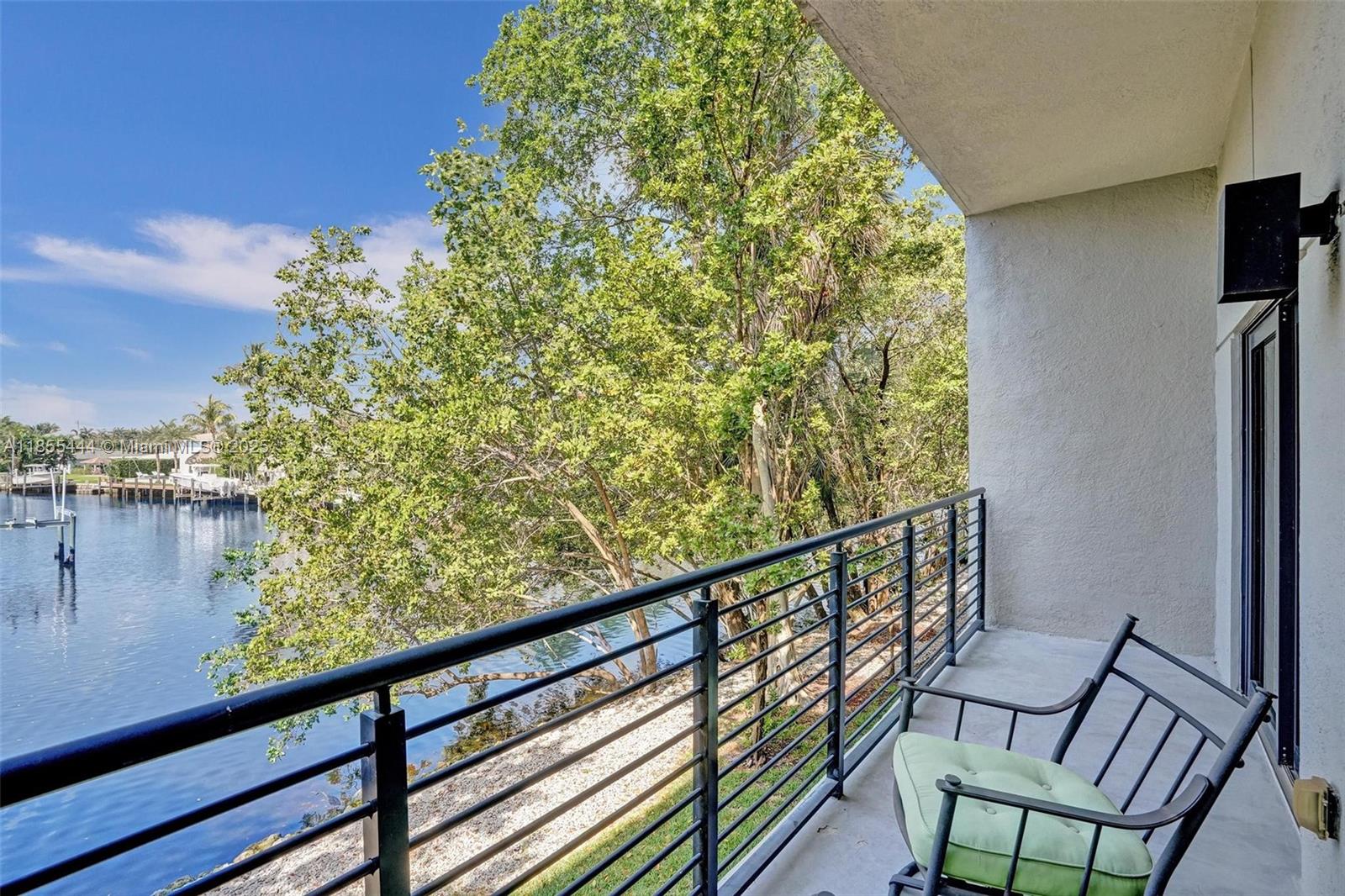 516 Southeast 1st Circle Pompano Beach, FL 33060 - Photo 30 of 81 a view of balcony with wooden floor