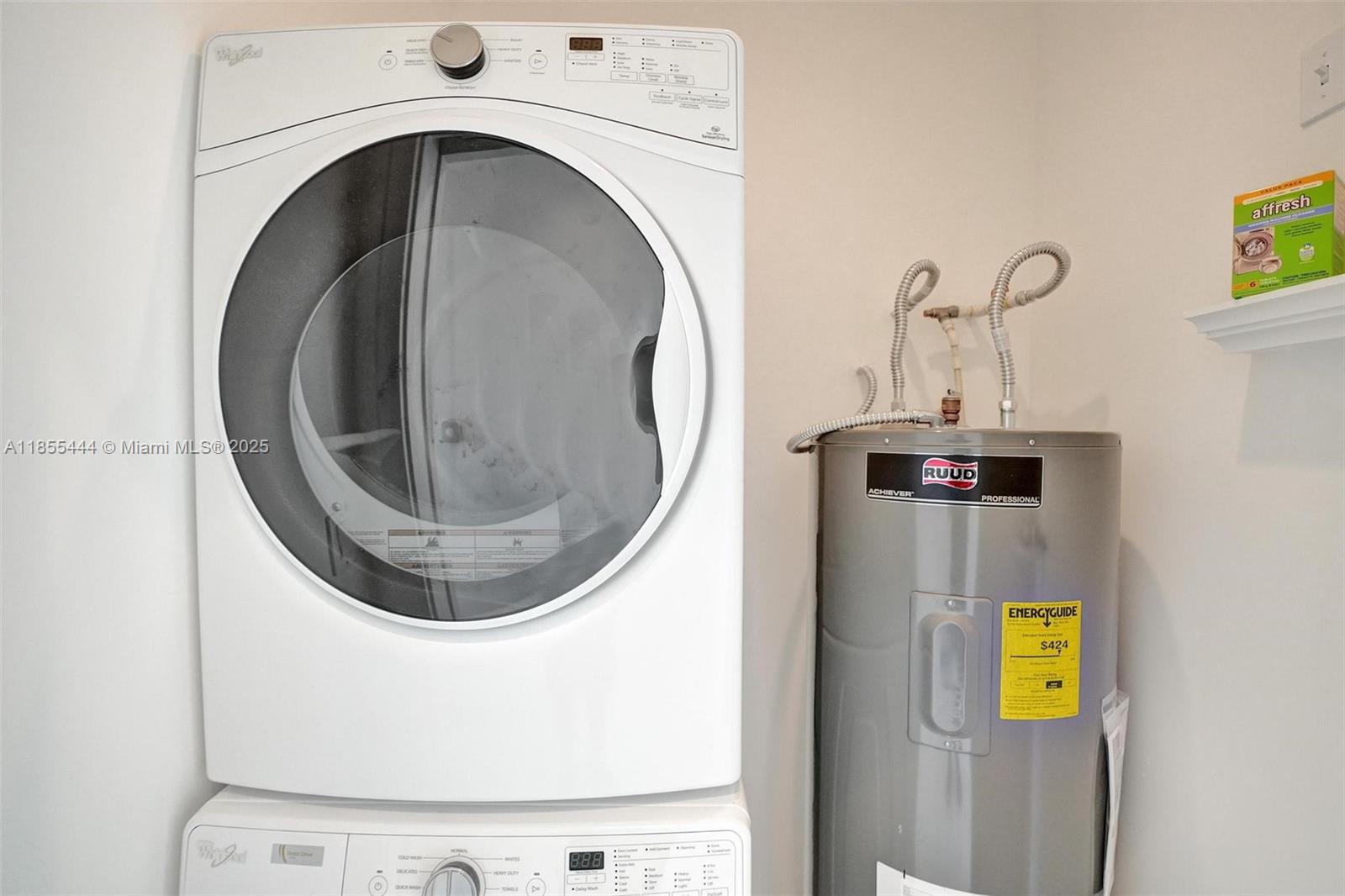 516 Southeast 1st Circle Pompano Beach, FL 33060 - Photo 50 of 81 a close view of a utility room with dryer and washer