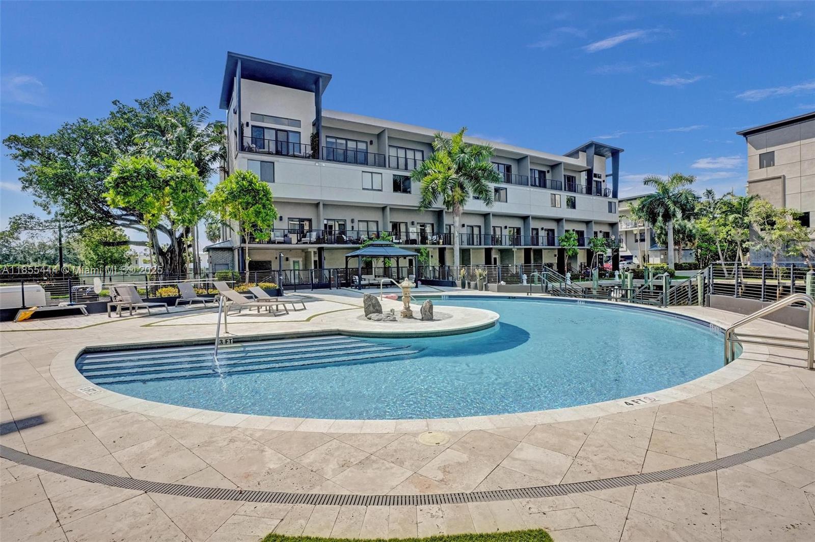 516 Southeast 1st Circle Pompano Beach, FL 33060 - Photo 71 of 81 a view of fountain with large trees