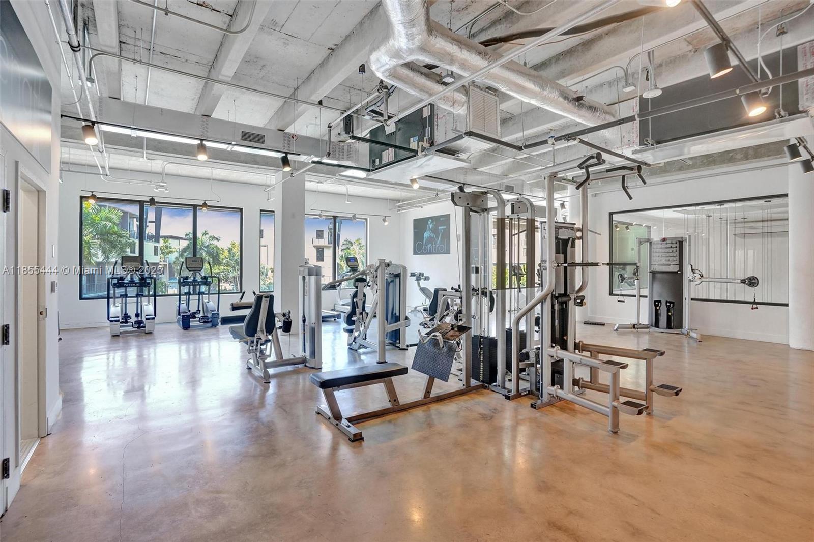 516 Southeast 1st Circle Pompano Beach, FL 33060 - Photo 76 of 81 a view of a room with gym equipment