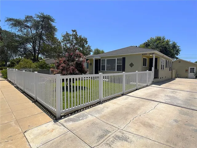 a front view of a house with a porch