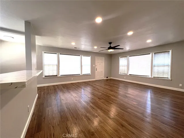 a kitchen with a sink stove and microwave