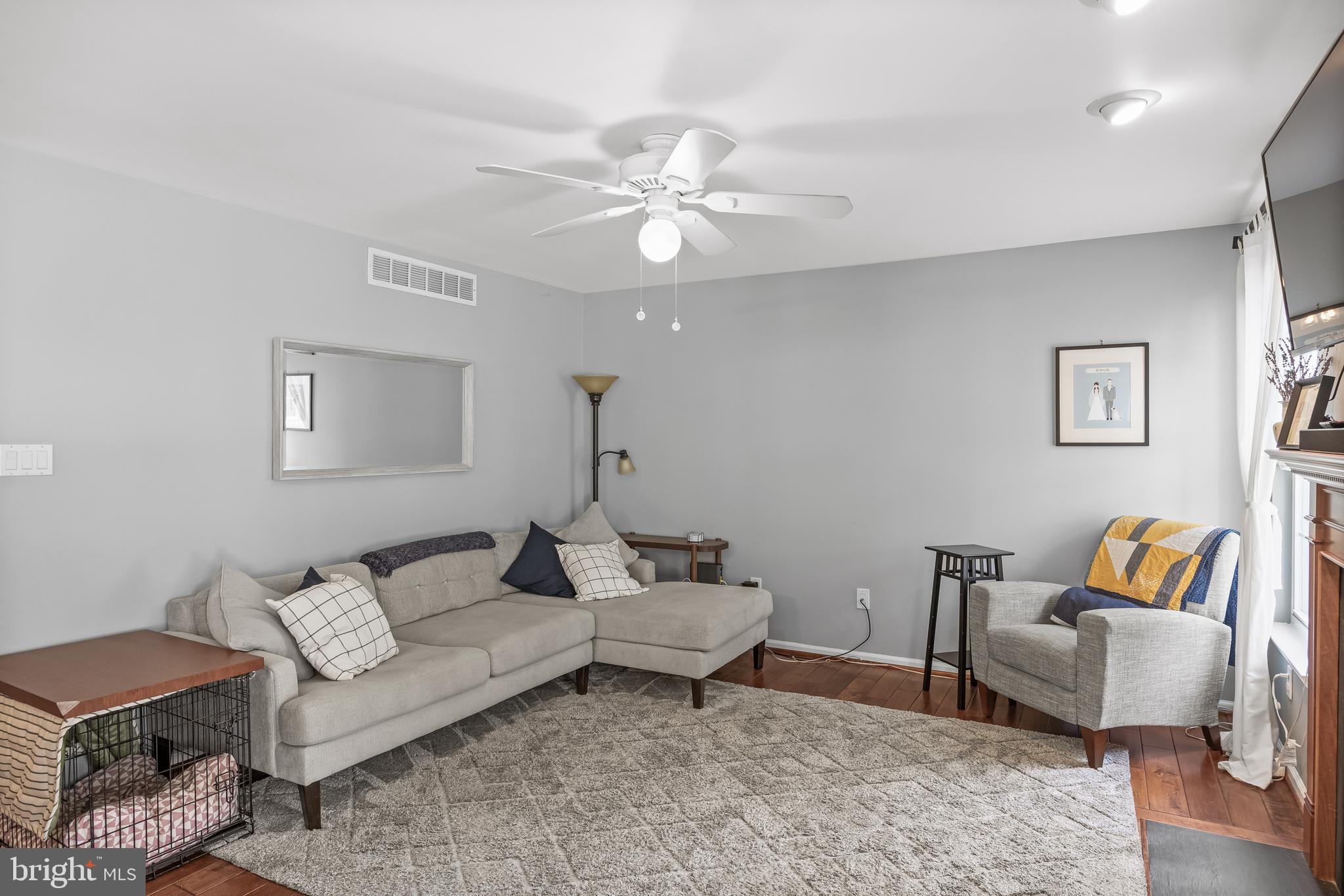 14 Vassar Road Mount Laurel, NJ 08054 - Photo 15 of 41 a living room with furniture and a lamp