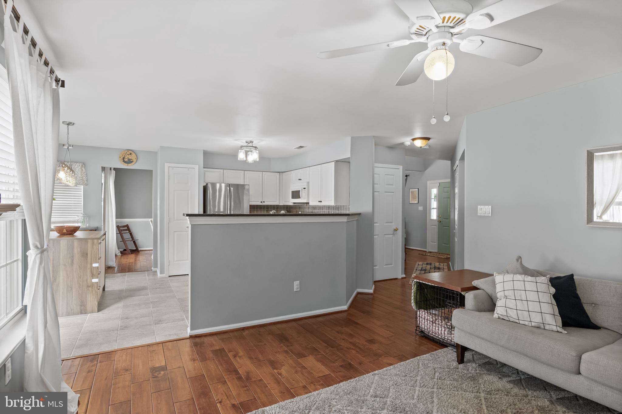 14 Vassar Road Mount Laurel, NJ 08054 - Photo 16 of 41 a living room with kitchen island furniture and a chandelier