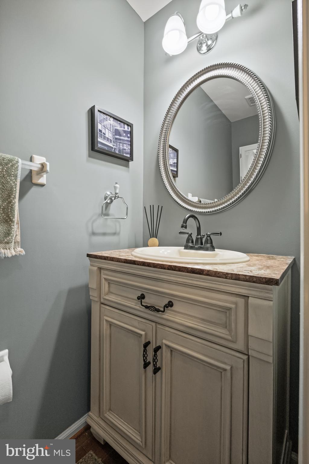 14 Vassar Road Mount Laurel, NJ 08054 - Photo 17 of 41 a bathroom with a toilet sink vanity and mirror