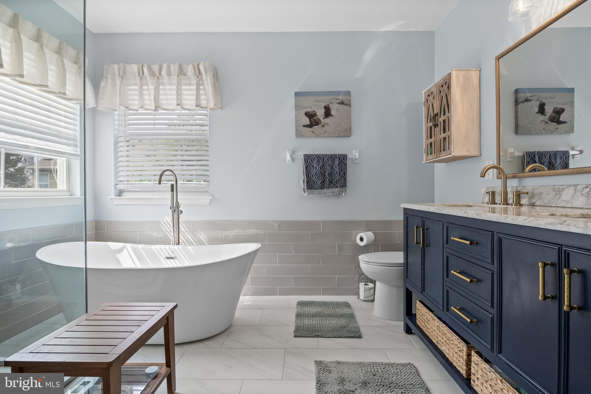 14 Vassar Road Mount Laurel, NJ 08054 - Photo 24 of 41 a spacious bathroom with a double vanity sink a mirror and a toilet