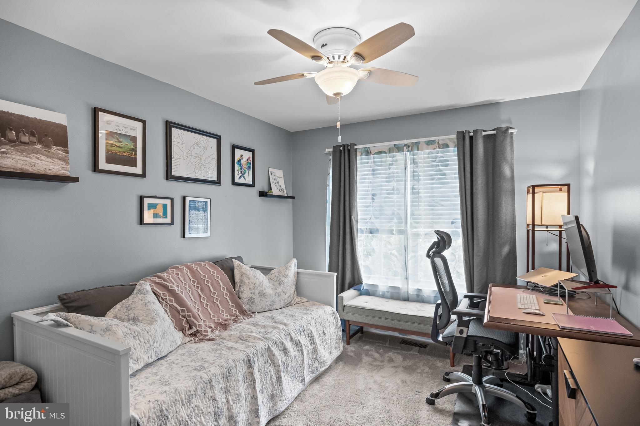 14 Vassar Road Mount Laurel, NJ 08054 - Photo 28 of 41 a living room with furniture two window and a flat screen tv