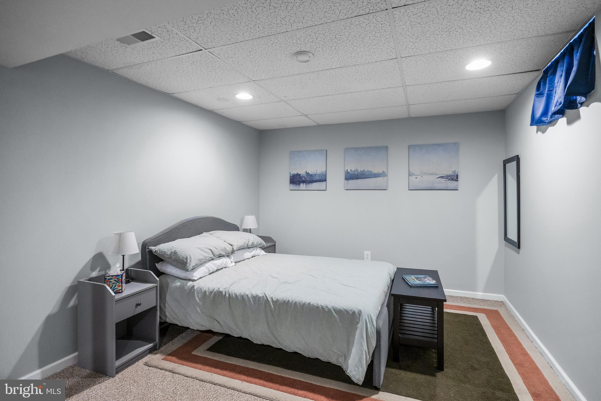 14 Vassar Road Mount Laurel, NJ 08054 - Photo 33 of 41 a bedroom with a bed and a table in it