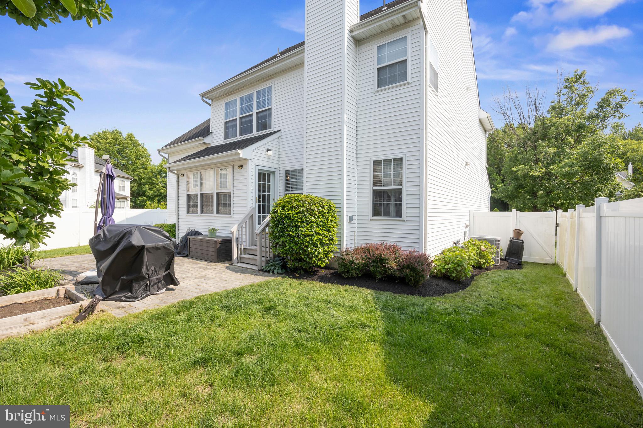 14 Vassar Road Mount Laurel, NJ 08054 - Photo 38 of 41 a view of a chair and table in backyard of the house