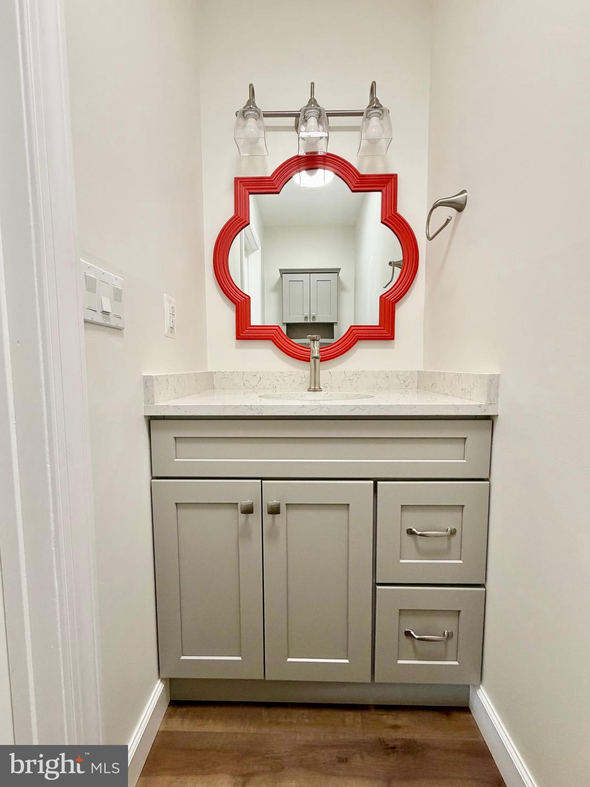 112 Chukar Court Lititz, PA 17543 - Photo 17 of 44 a bathroom with a sink and a mirror