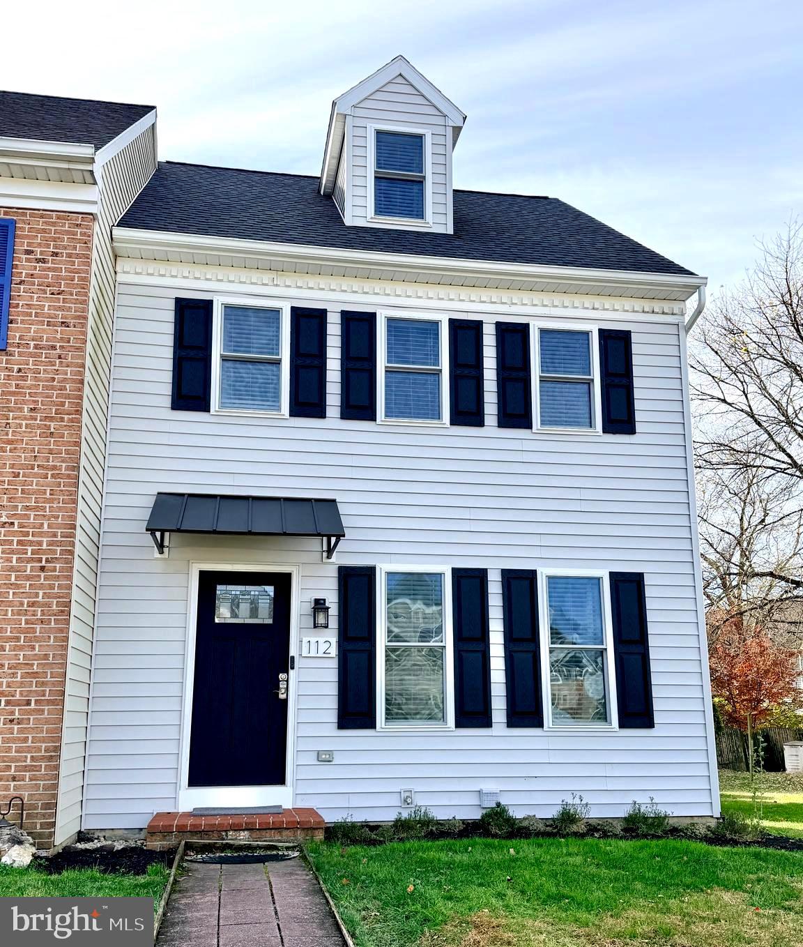 112 Chukar Court Lititz, PA 17543 - Photo 2 of 44 a front view of a house with garden