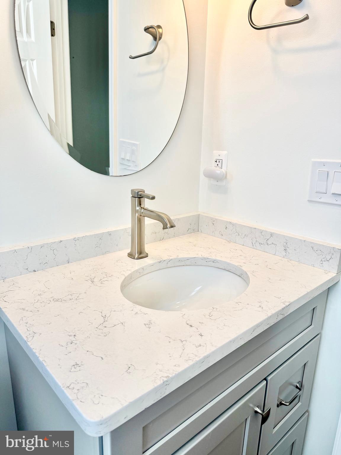 112 Chukar Court Lititz, PA 17543 - Photo 24 of 44 a bathroom with a sink and a mirror