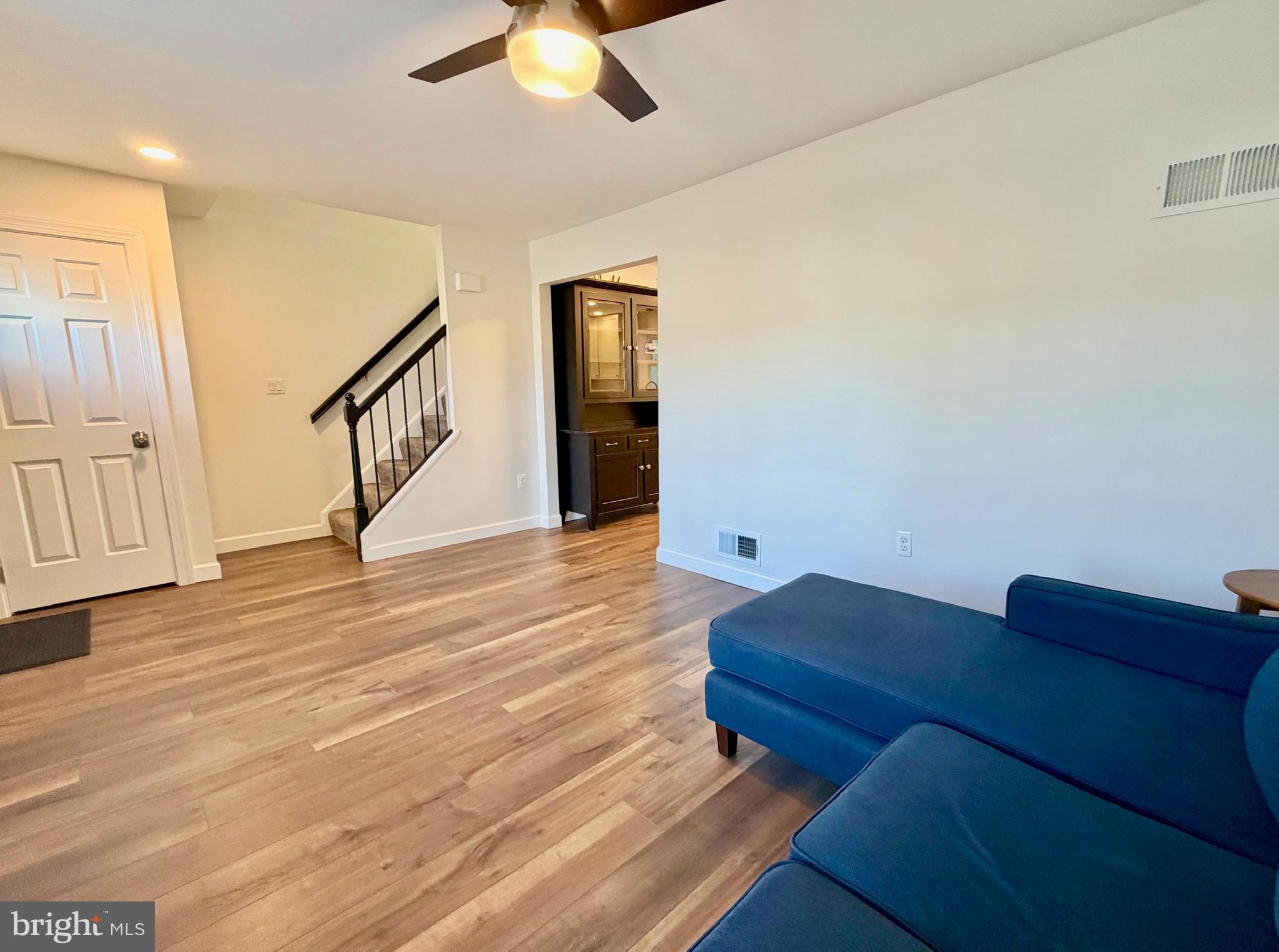 112 Chukar Court Lititz, PA 17543 - Photo 5 of 44 a living room with furniture and a wooden floor